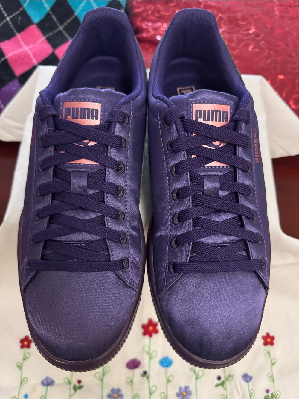 NWOT Purple PUMA shoes. Satin textured, traditional lace closure, and gum soles.
